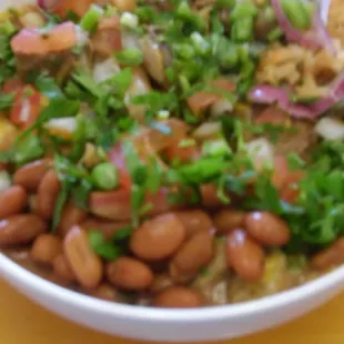 Bowl with red and green pork $6. Decent but wasn't a fan of the refried beans at the bottom.