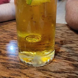 a glass of beer on a table