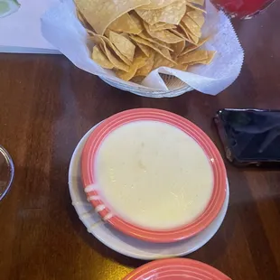 Chips, salsa, cheese sauce
