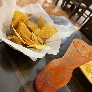 Second basket of tortilla chips and the last bit of salsa