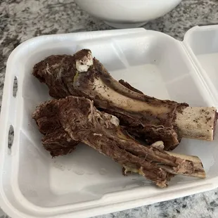 The beef was packaged separately when it's a to go order.