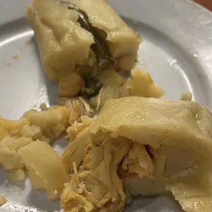 Extremely tender, moist and flavorful chicken tamale.