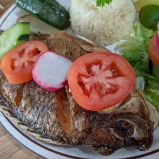 grilled fish with vegetables and rice