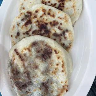 Cheese pupusa, bean cheese, and pork pupusa, and steak pupusa