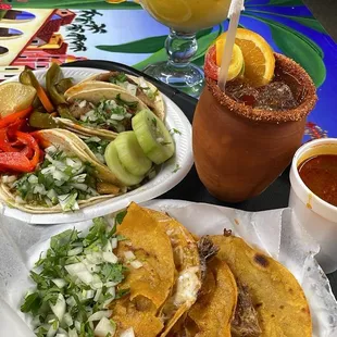 Birria Tacos, jarrito, and mango margarita