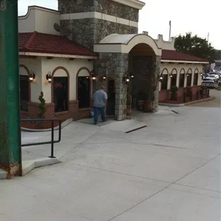 a man entering a restaurant