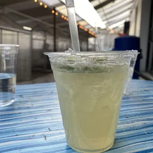 a drink in a plastic cup