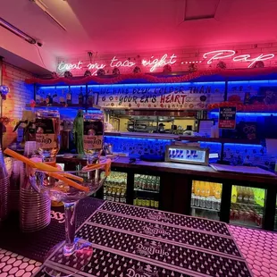 a bar with neon lights