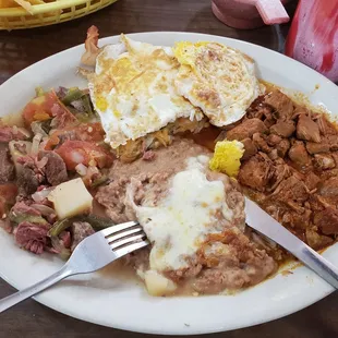 You get two different kinds of meat.   Beef under one divorced egg and pork under the other