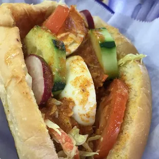 a close up of a sandwich in a basket