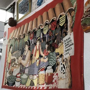 a mural on the wall of a mexican restaurant