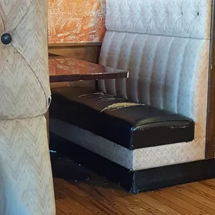 Another booth from where we were seated with tears all over it.