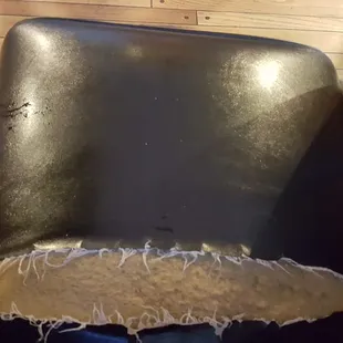 When you have a tear as wide as an adult hand it's time to replace your seating.