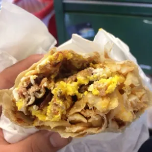 Breakfast burrito bacon eggs cheese potatoes can you say delicious