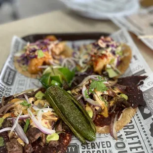 taco el chingon : grilled chihuahua cheese, grilled steak, grilled onions, salsa avocado jalapeño, ranchera salsa and Eagan secret sauce.