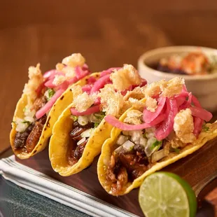 three tacos on a plate