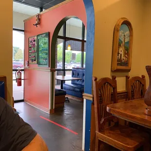 a man sitting at a table in a restaurant