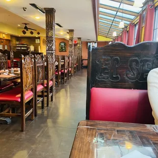 a restaurant with a long line of tables