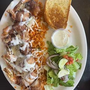 Momia shrimp (shrimp wrapped in bacon on bed of rice) came with salad and store bought garlic toast.