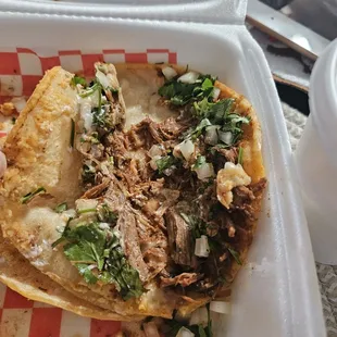 a close up of a taco