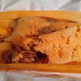 Tamales. Meat runs all the way through. Tender, not greasy or rubbery.