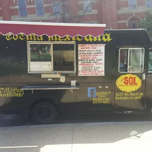 food truck parked on the side of the road