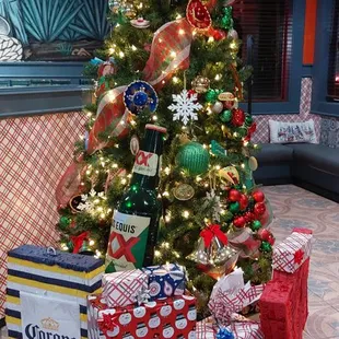 Cool Christmas tree. Love the Dos Equis ornament!