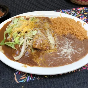 Enchiladas and Tamales Lunch Platter - Sauce, beans, cheese all seem to meld together (4 stars)