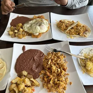 Chorizo with Scrambled Eggs, Chilaquiles and homemade corn tortillas.