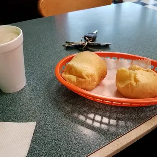 Not sure of the name. but warm bread  stuff with cheese and milk coffee