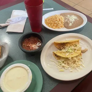 Two tacos rice and beans lunch special $6.99