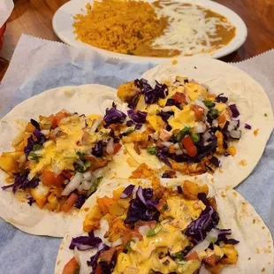 Fish tacos, includes rice and beans - $14