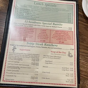 a menu and a cup of coffee