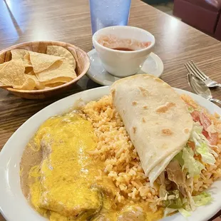 Combination dinner with chili relleno, soft chicken taco and rice
