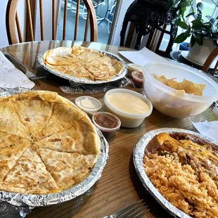 Chicken and beef quesadilla, beef enchilada, white queso and chips