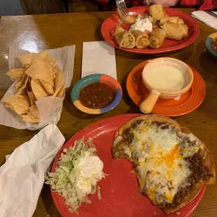 Tortilla Loca, Chicken Taquito, salsa and cheese dip.