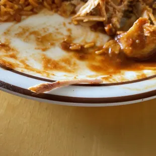 Bit a bone halfway eating enchilada.