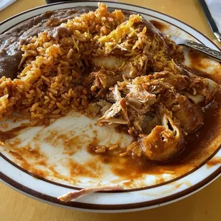 Bit a bone halfway eating enchilada.