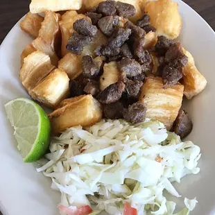 Yuca/chicharron $10 kind of steep but so good! (Small pieces of pork) not like how it used to be!