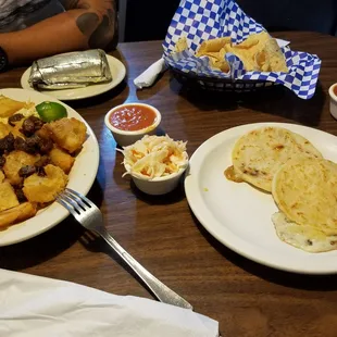 Good selection. Yucca  (fired nice and crispy), pupusas were small. Chips and spicy salsa??? And a tamale.