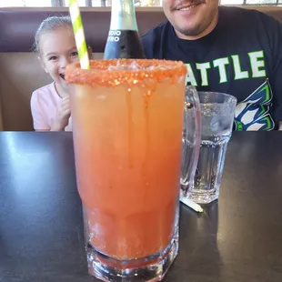 a man and a child at a table