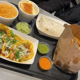 3 street tacos, asada burrito, chips and guacamole, side of rice, esquite