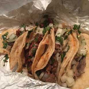 Tripas on the left, one deshebrada, and one Asada