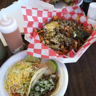 Fish taco, beef taco, carne asada fries and beef torta