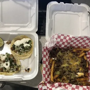 Two chicken mini taco w/sour cream and a half order of CarneAsada fries. Itsa da bess