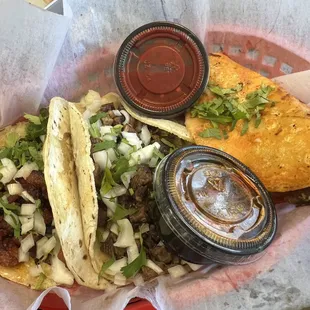 Al pastor, lengua, and birria tacos