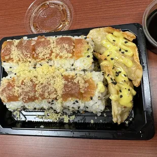 Spicy tuna roll and those 2 dumplings are what comes in the combo