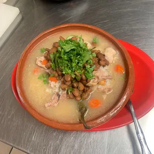 Caldo de pollo con arroz y garbanzos  all home made Mexican food.