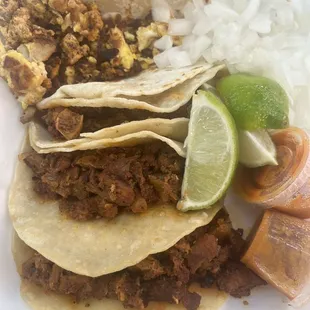 Al pastor tacos NO PINEAPPLE AFTER SHE SAID THEY COME WITH IT.