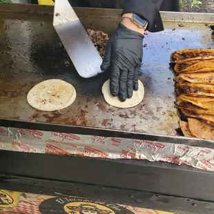 The cateter cooking my beef tacos